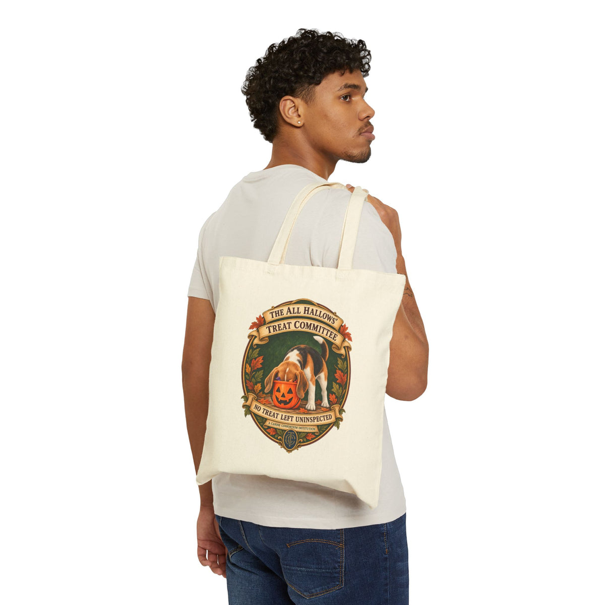 Man carrying natural canvas Beagle Halloween tote over his shoulder, back lifestyle view